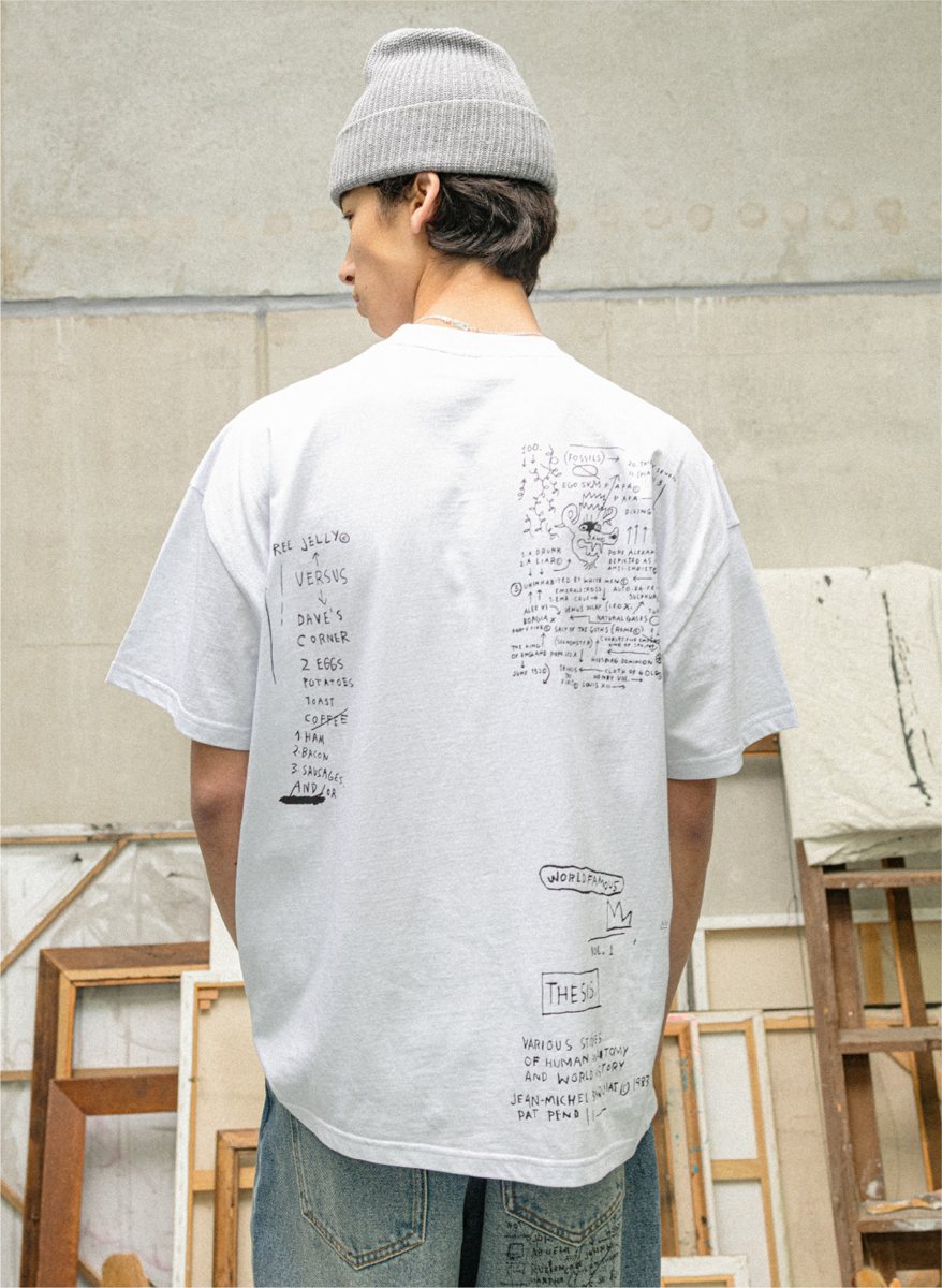 I Love Ugly x Jean-Michel Basquiat: Back of the white tee covered in Basquiat notebook prints