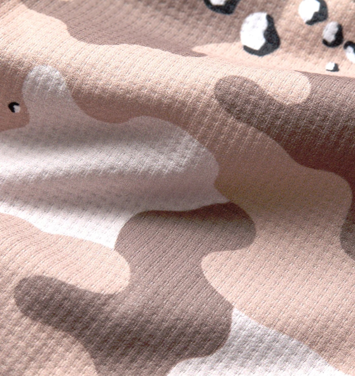 Close-up of the desert camo print on the waffle knit