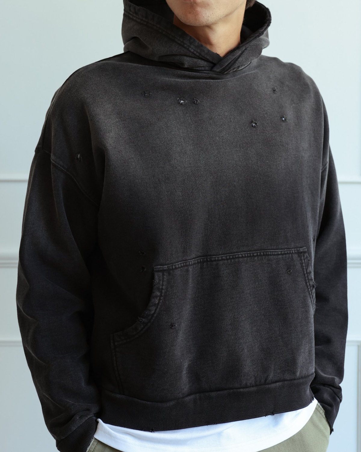 Washed black distressed cropped hoodie with kangaroo pocket
