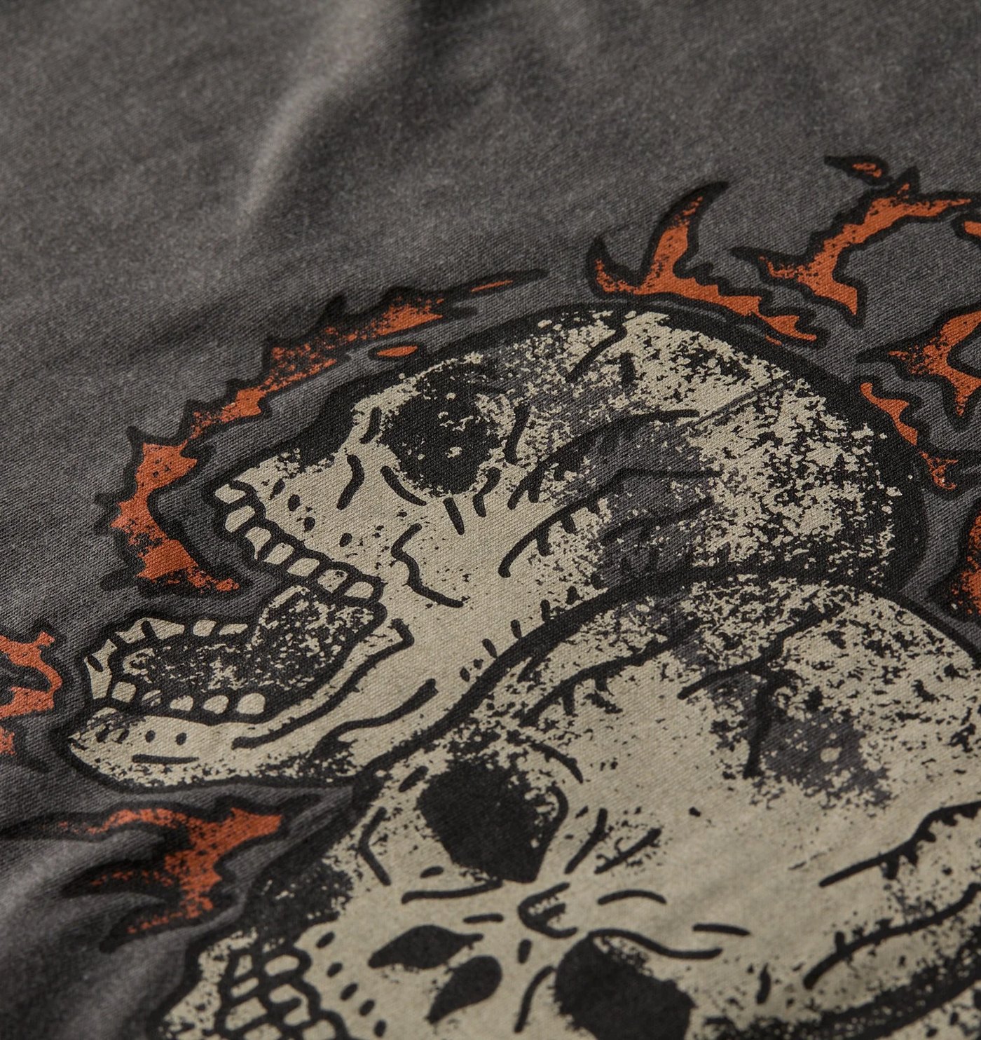 Close-up of the distressed skull and flame print