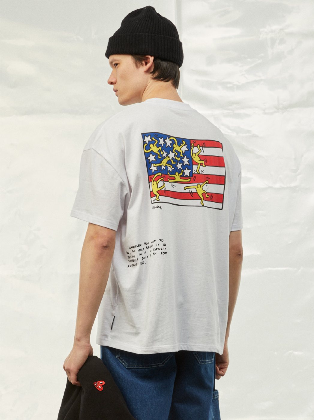 I Love Ugly x Keith Haring: White tee with Keith Haring American flag back print