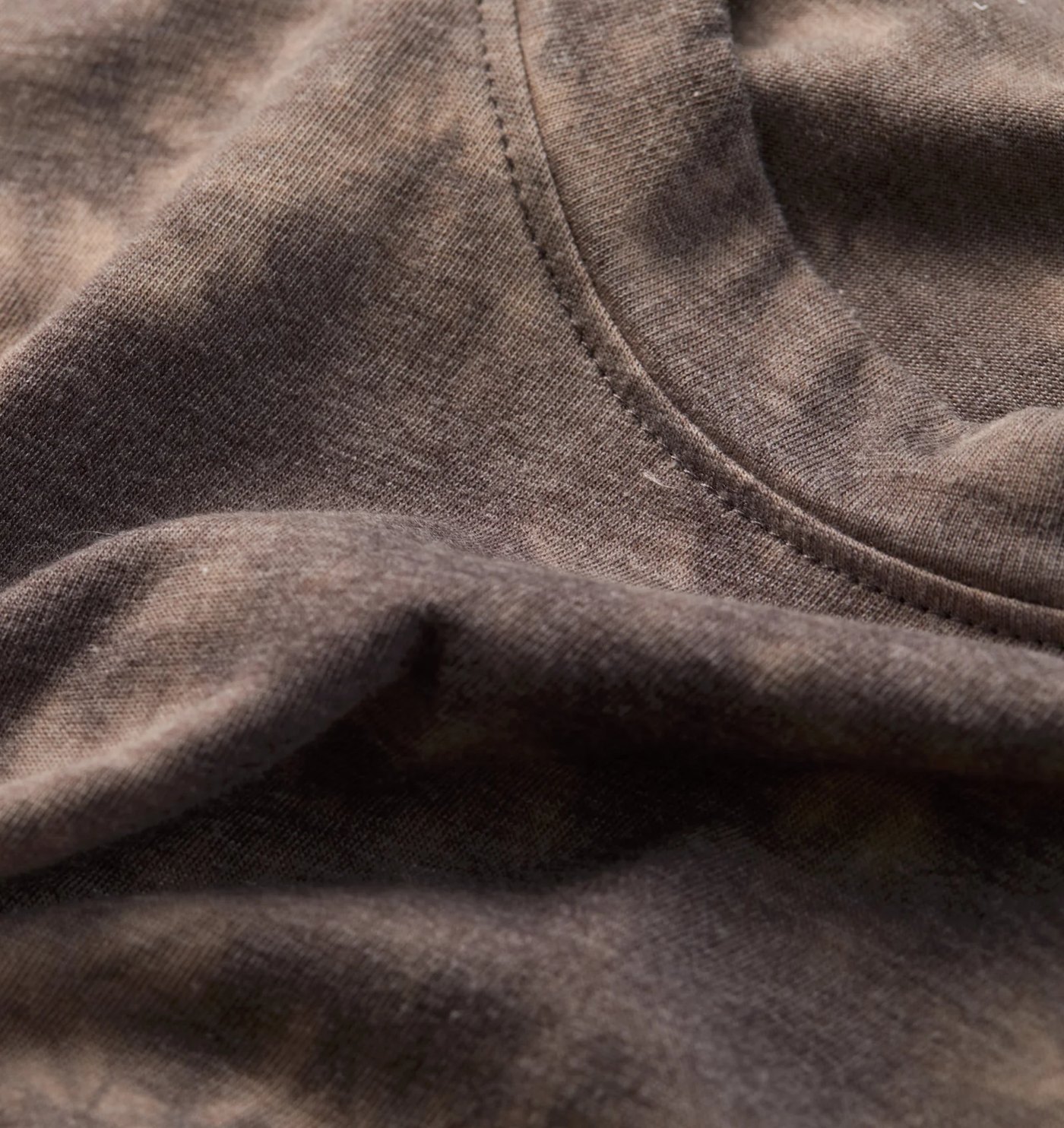 Close-up of the tie dye jersey and neckline