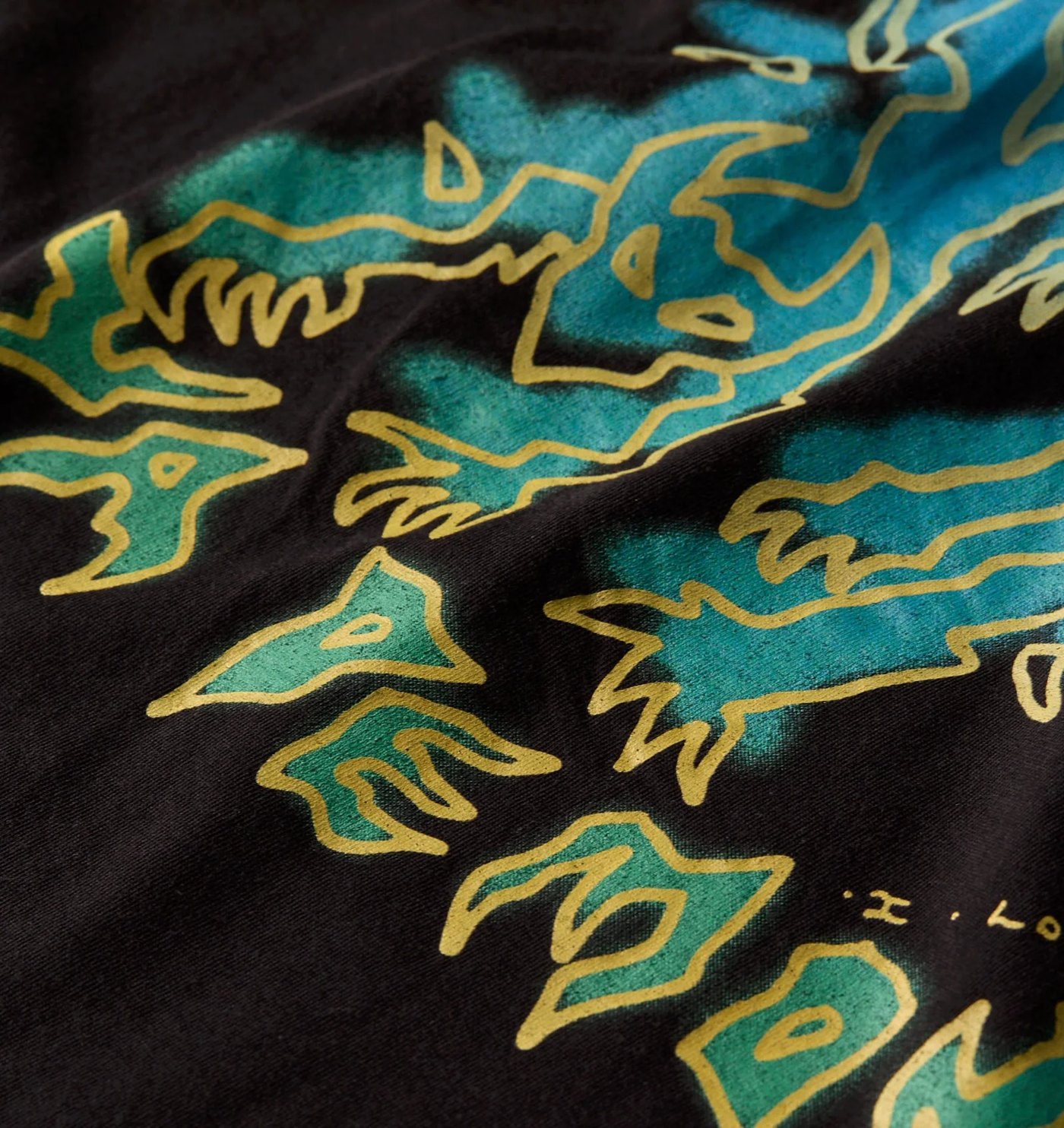 Close-up of the airbrushed demon figures in the graphic