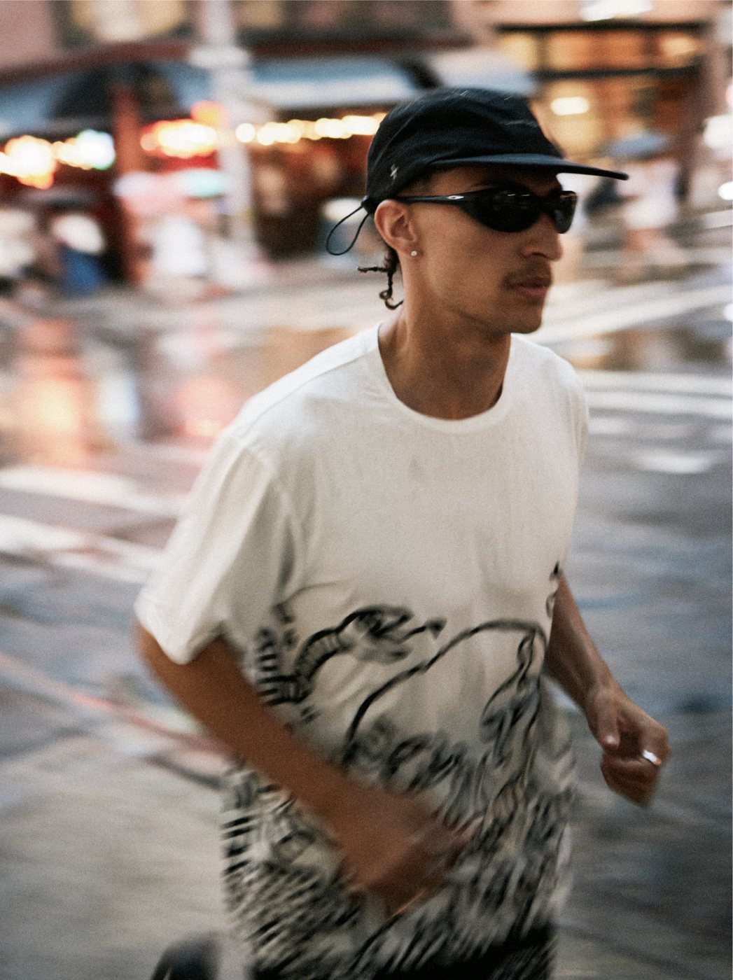 I Love Ugly x Keith Haring: Runner in a Keith Haring print tee