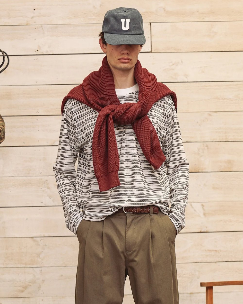 Ecru and brown stripe waffle long sleeve with a burgundy knit tied over the shoulders