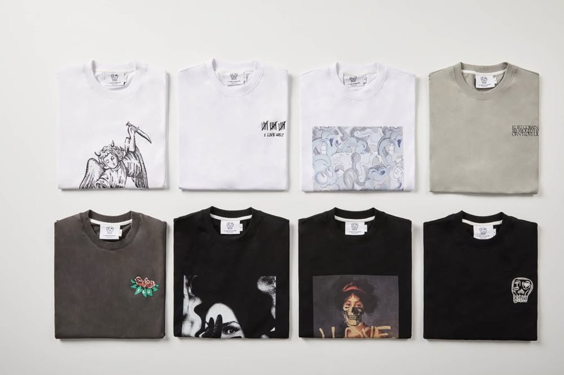 Eight folded anniversary graphic tees