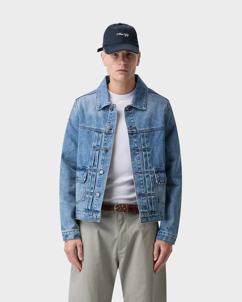 Mid wash pleated front denim trucker jacket