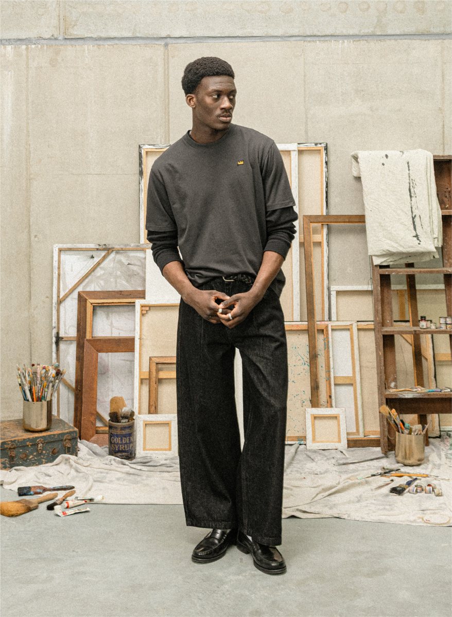 I Love Ugly x Jean-Michel Basquiat: Crown-embroidered black tee with black wide-leg denim