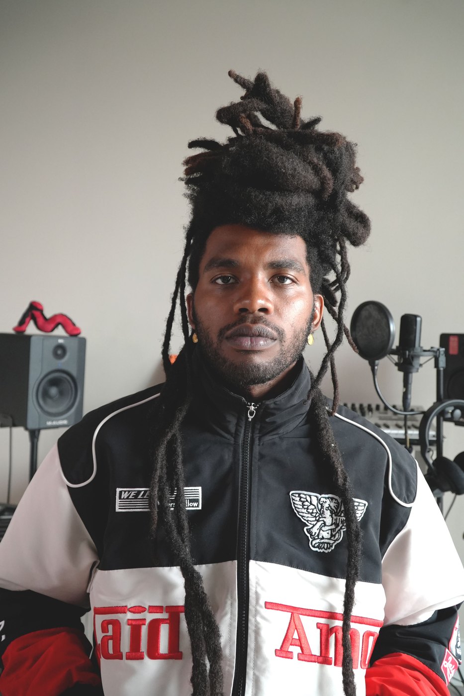 Portrait in the black, white and red Laid Amour racing jacket