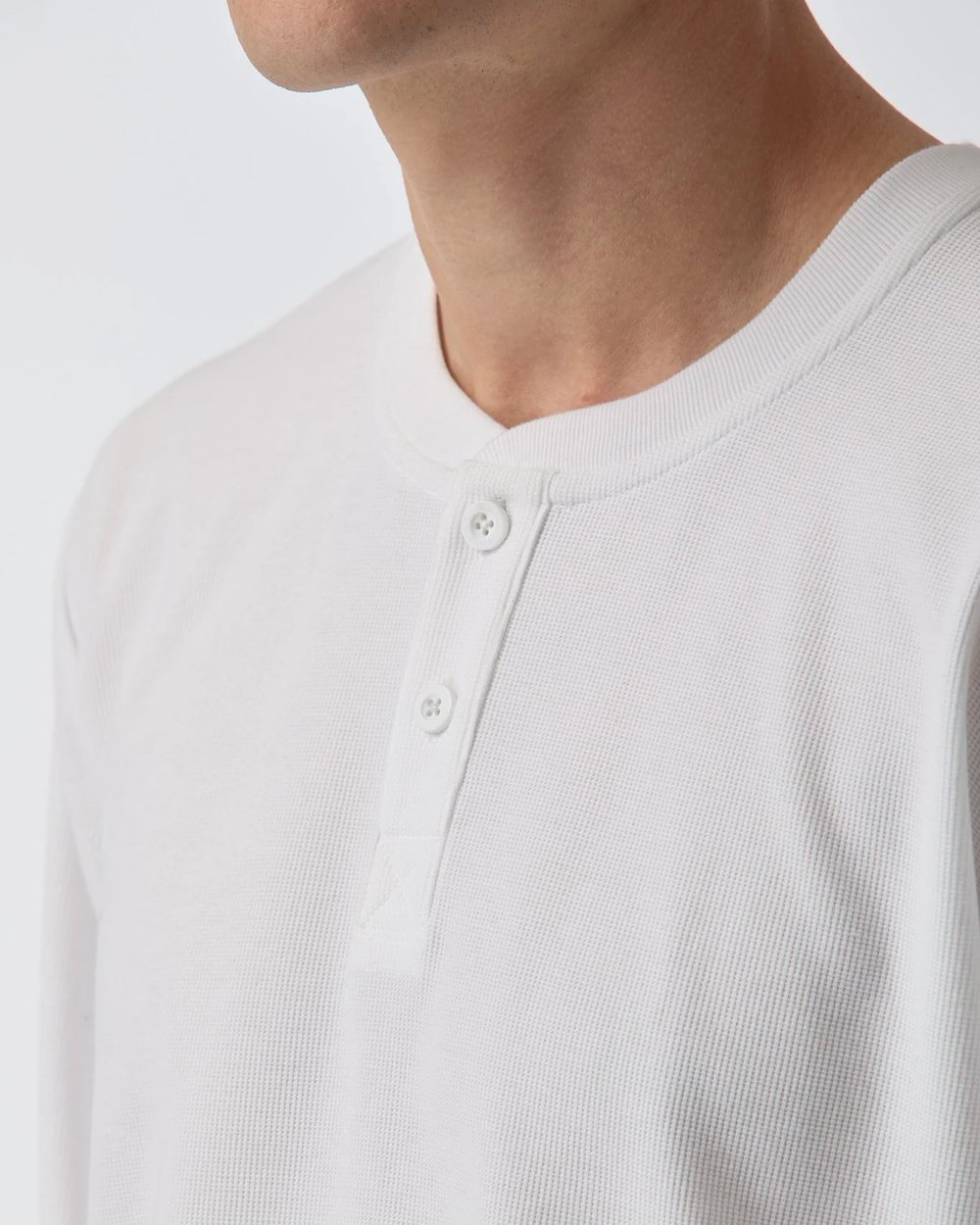 Close up of the waffle henley placket and ribbed neckline