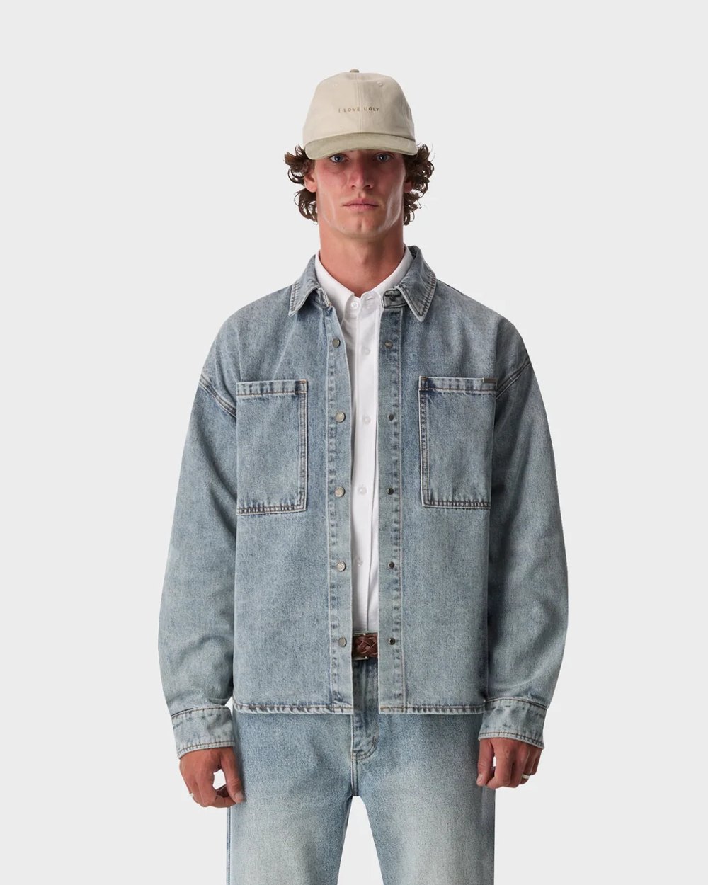 Light wash boxy denim overshirt with twin patch pockets