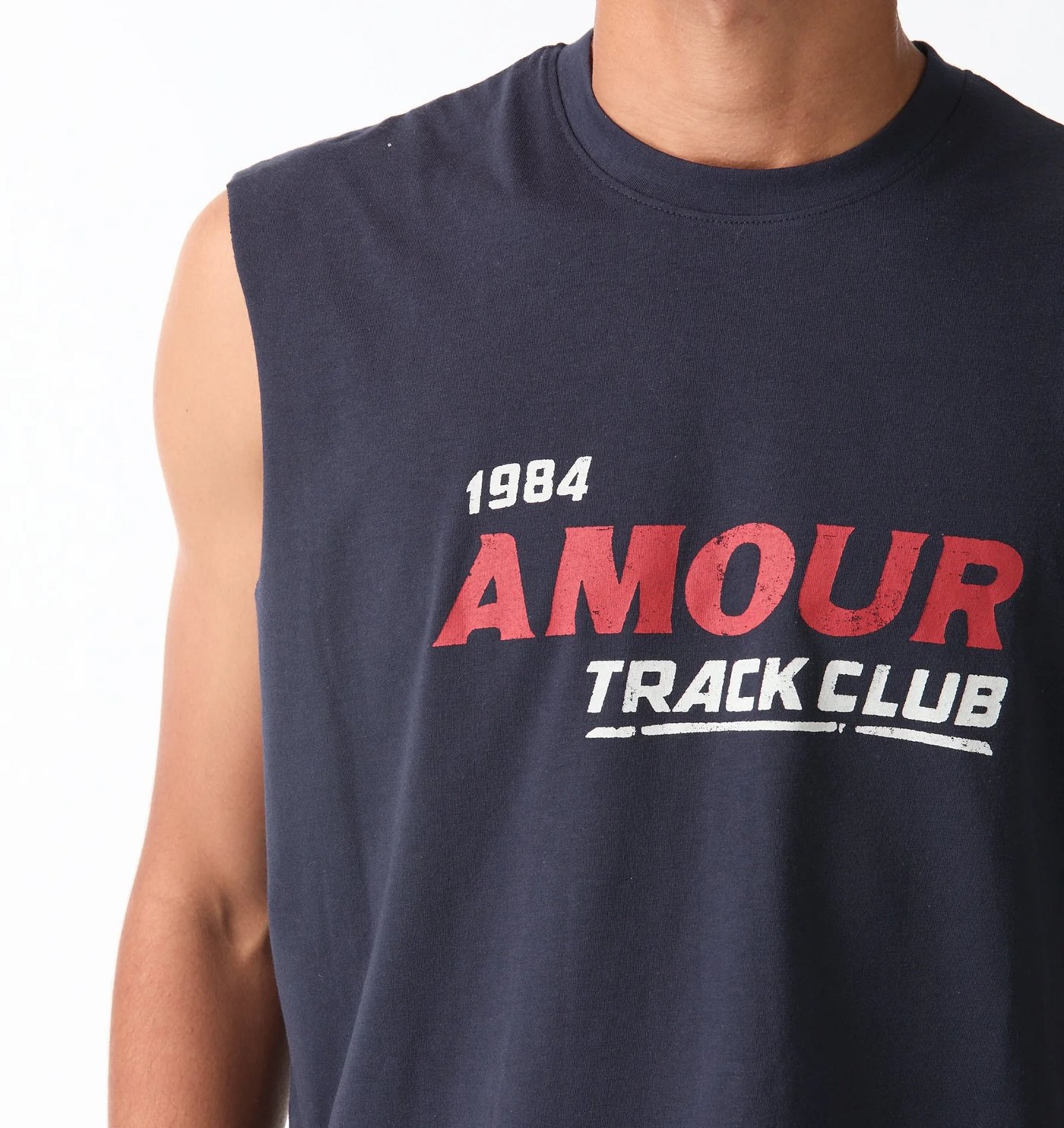 Navy muscle tank with red and white 1984 Amour Track Club graphic