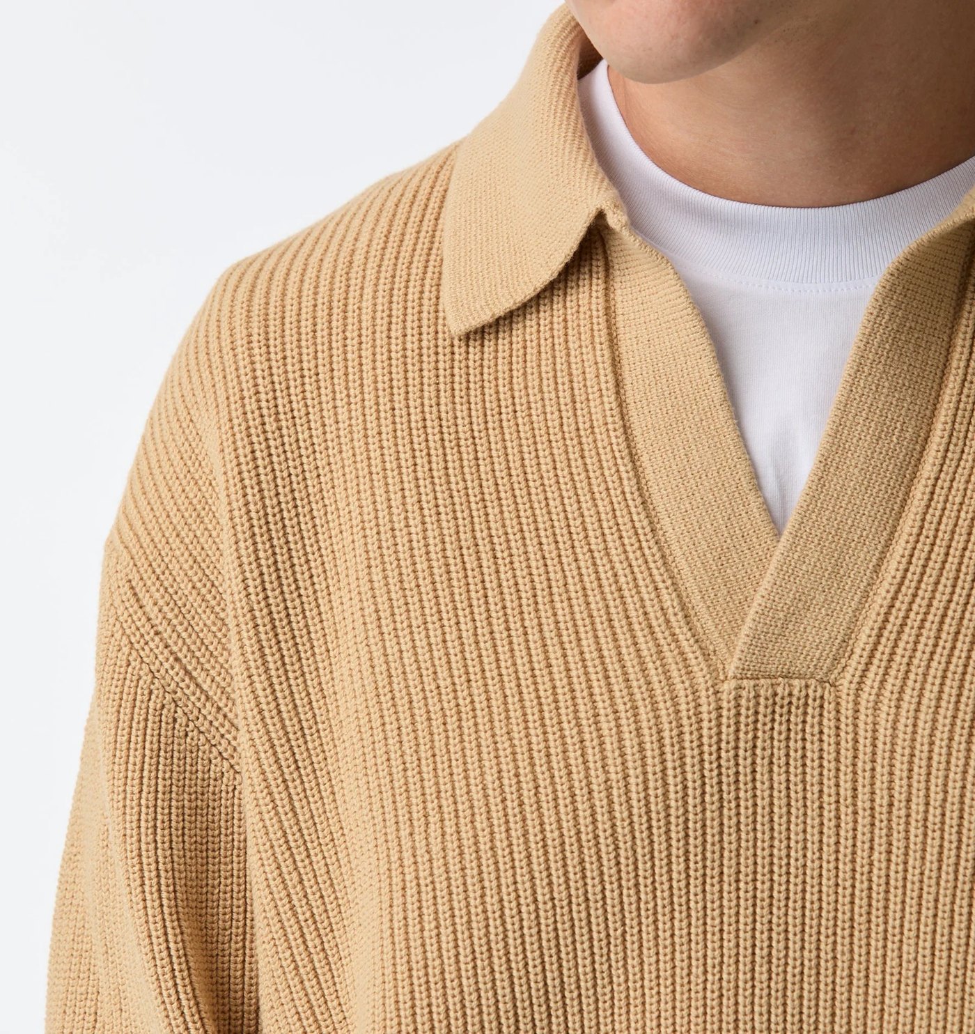 Close-up of the knit polo collar and ribbed texture