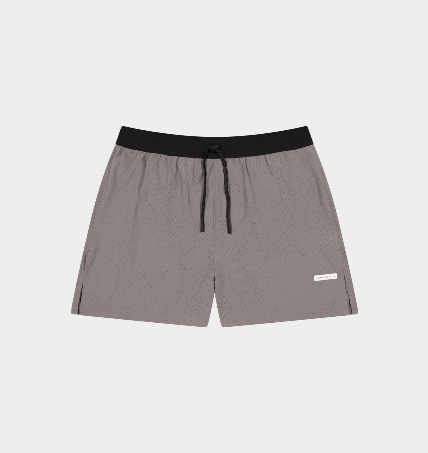 Grey laser-perforated performance split short with black waistband, flat lay