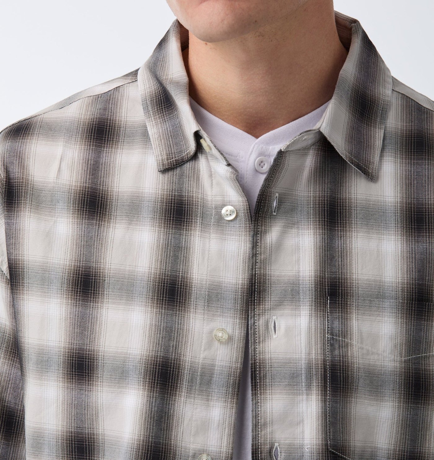 Close-up of the shadow plaid shirt collar, placket and chest pocket