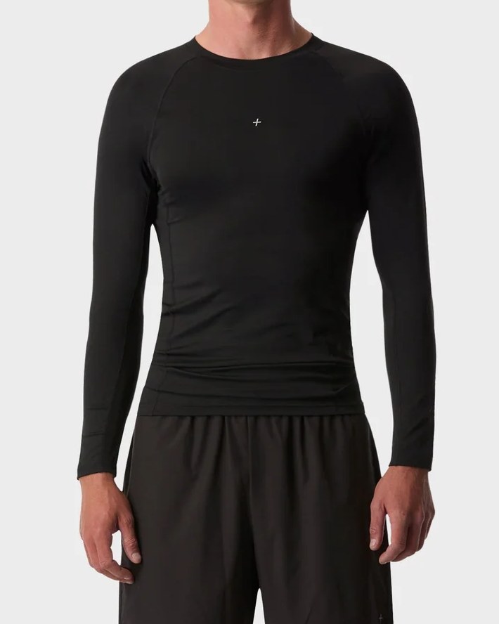 Black long sleeve compression top with raglan sleeves