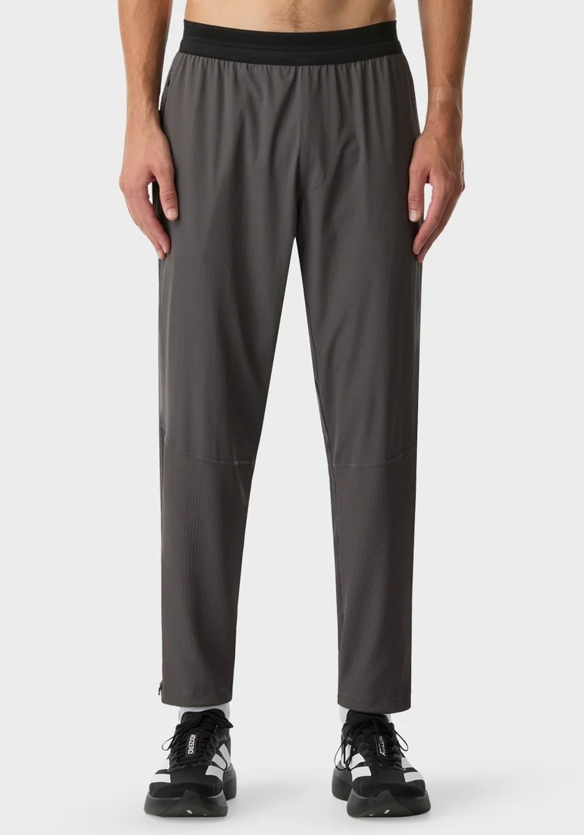 Charcoal tapered run pant with ribbed lower legs and black waistband