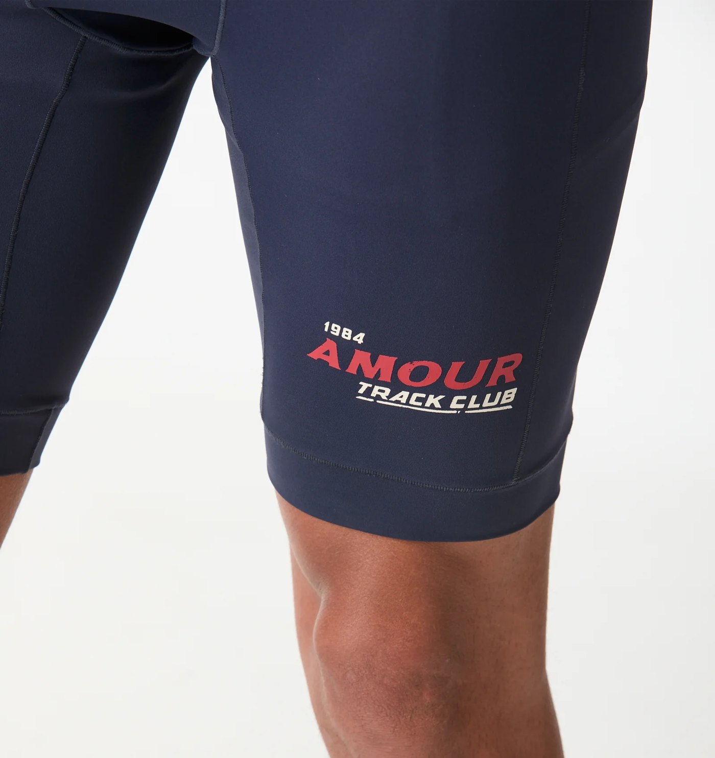 Close-up of the 1984 Amour Track Club print on the thigh