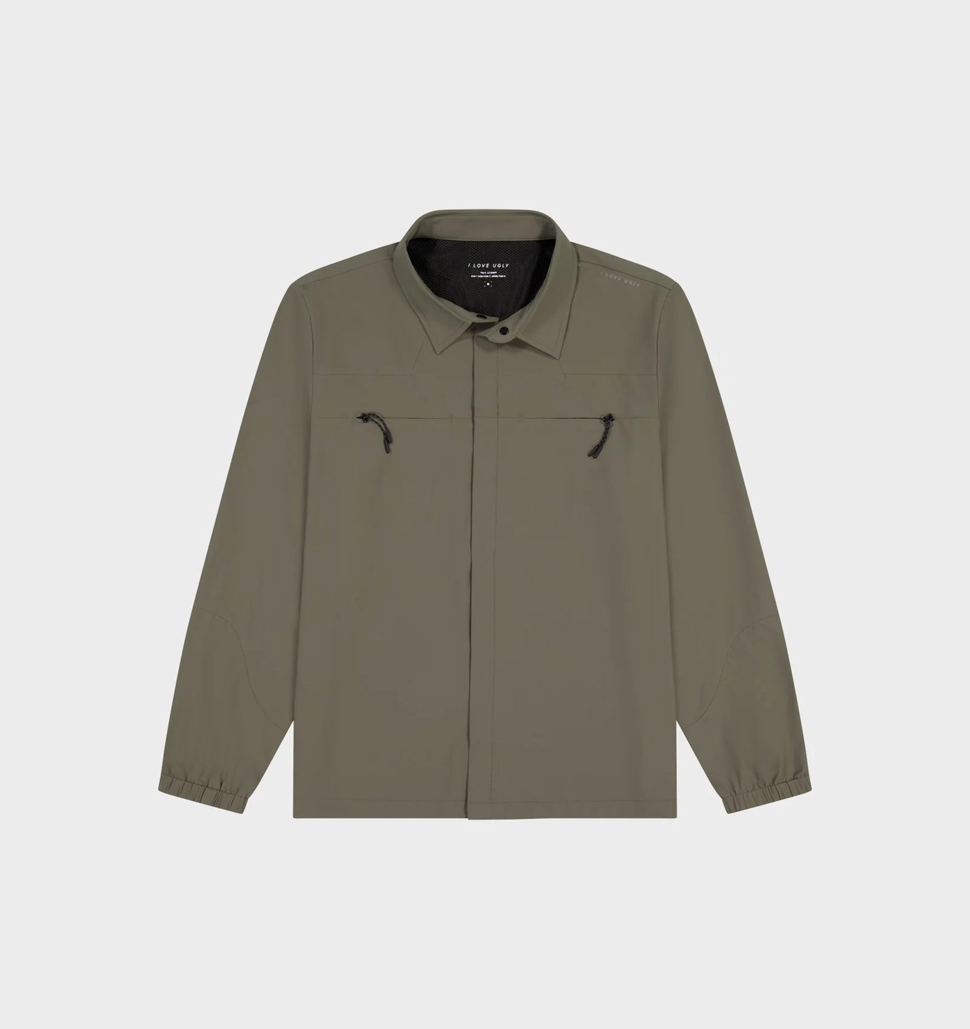 Olive stretch woven trail shirt with concealed placket and drawcord chest pockets, flat lay