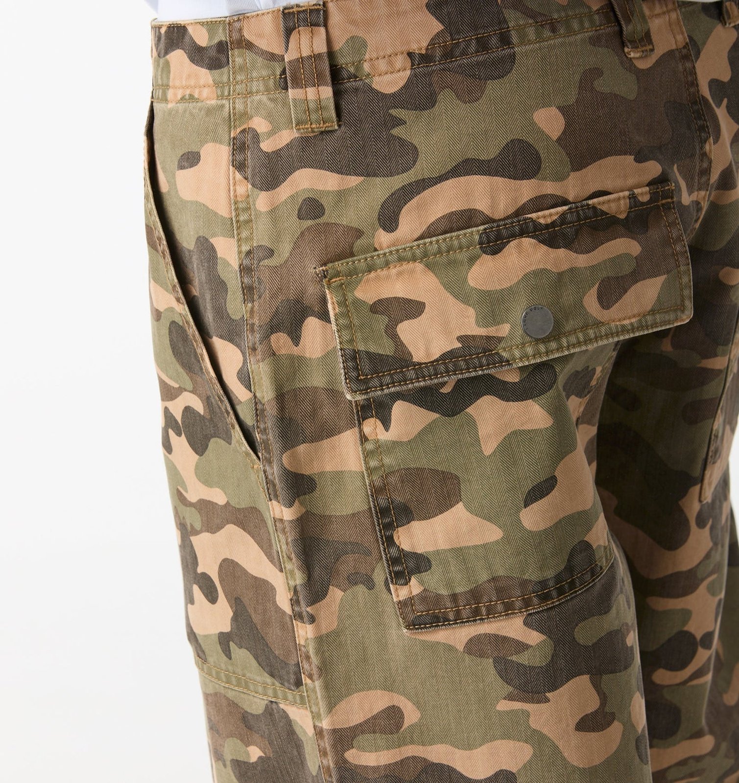 Close-up of the Fatigue Pant camo herringbone fabric and flap cargo pocket