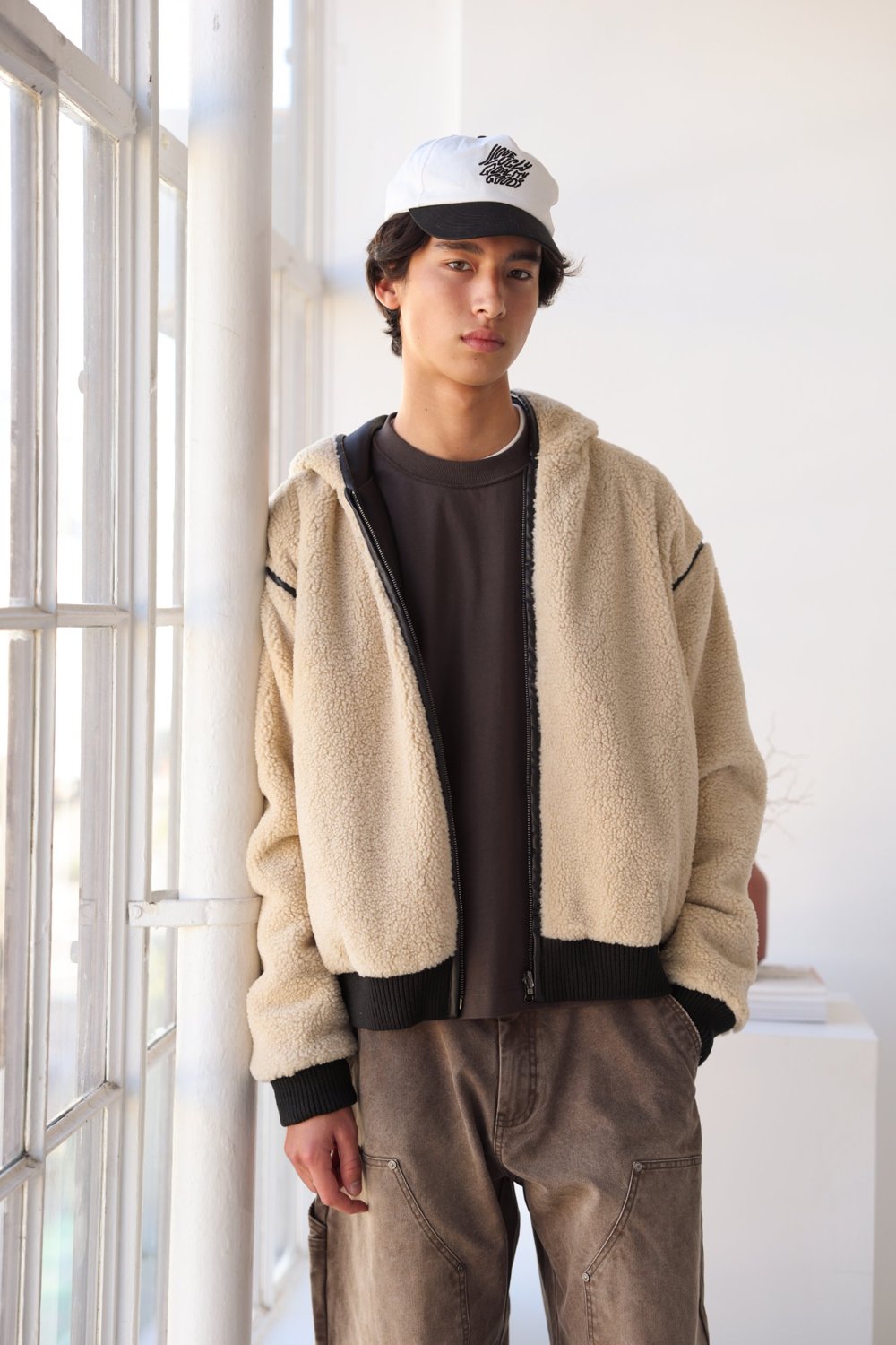 Faux Leather Hood Jacket worn reversed, sherpa side out