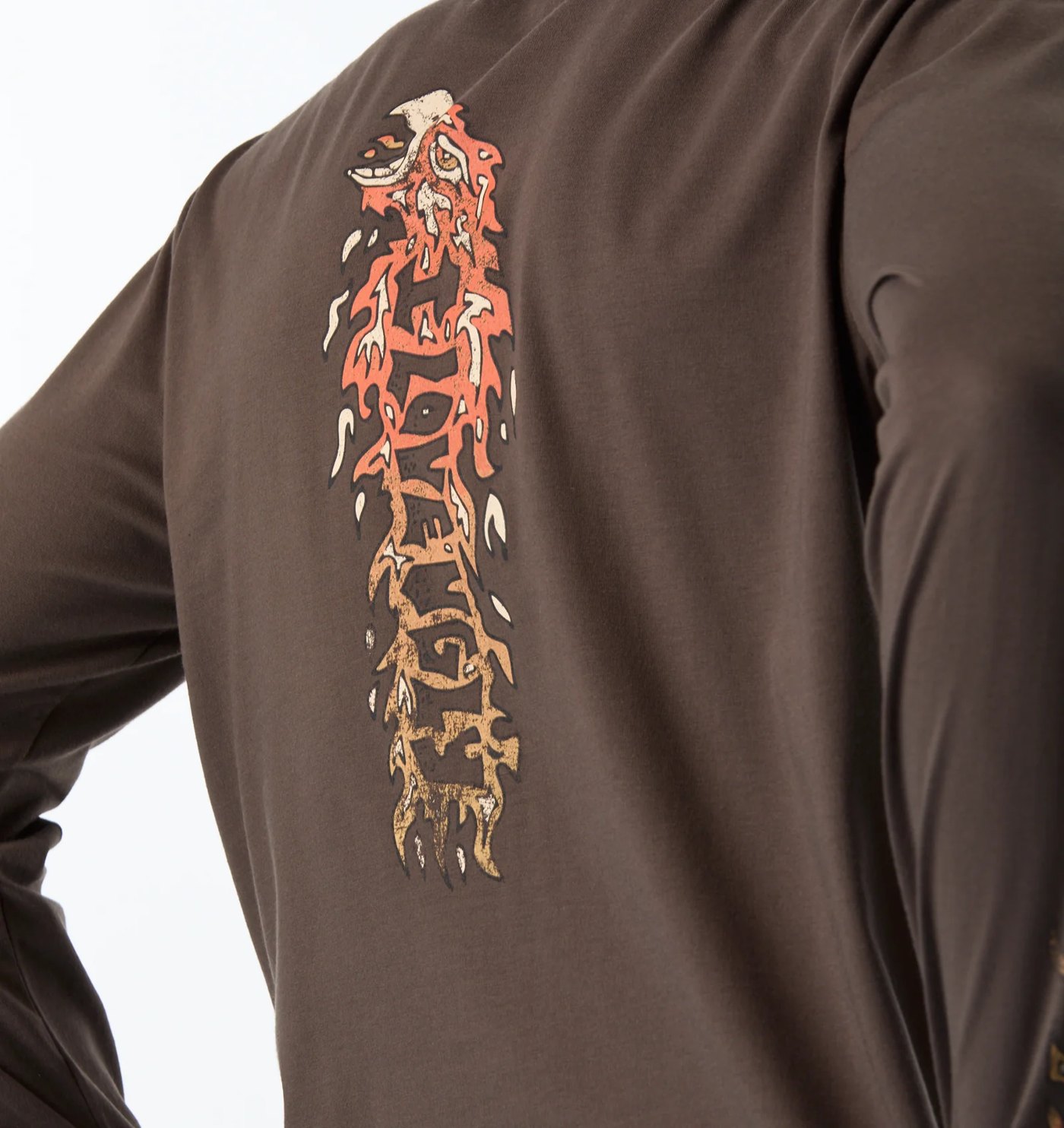 Close-up of the distressed fire bird print running down the shirt